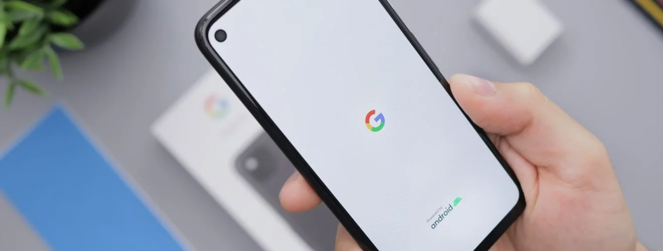 person holding black android smartphone